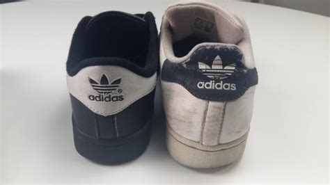 how tell if adidas wind breaker is fake|real vs fake adidas.